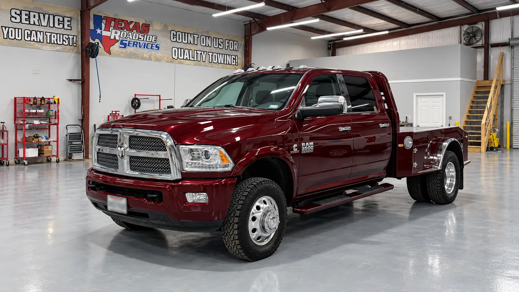 Maroon Ram dually inside the Rayco shop